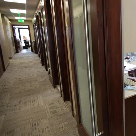 a hallway with glass doors