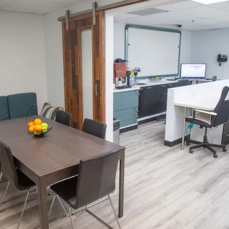a room with a table and chairs