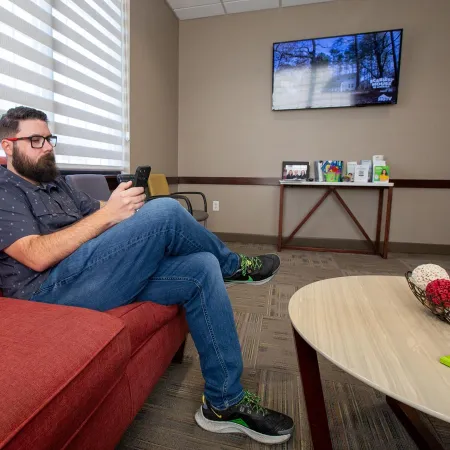 a person sitting on a couch