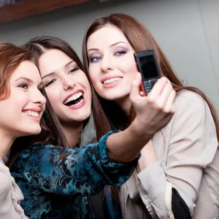 a group of women smiling