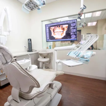 a hospital room with a tv