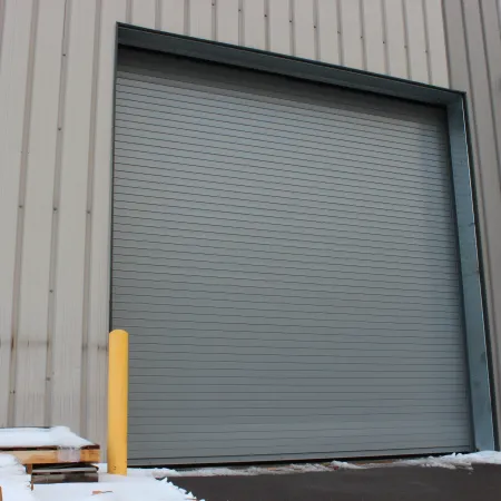 a garage door with a metal door