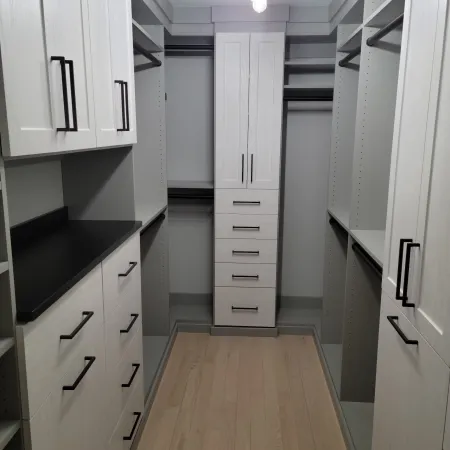 a room with white cabinets