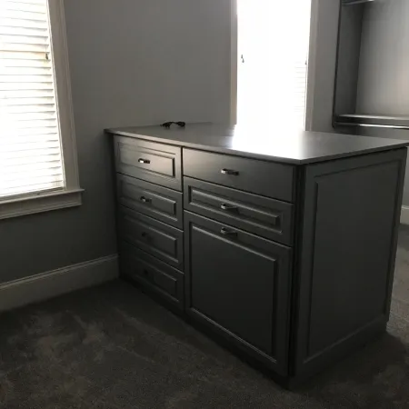 a black cabinet in a room