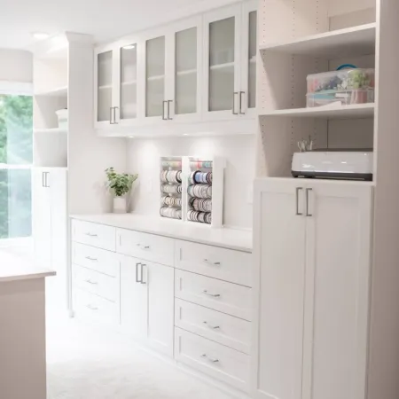 a white kitchen with white cabinets