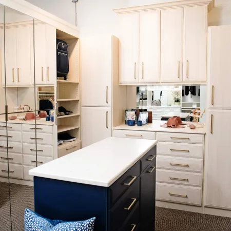 a kitchen with white cabinets