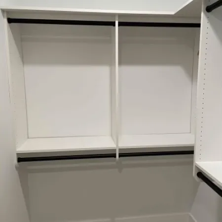 a white cabinet with a white door