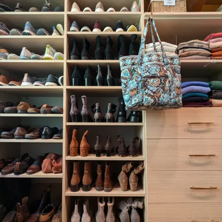 a shelf with shoes and shoes