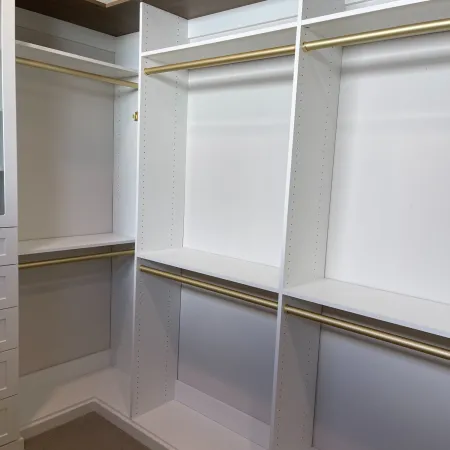 a white cabinet with glass doors