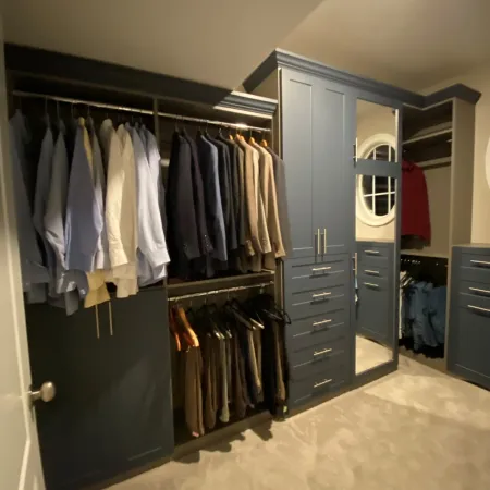 a closet with clothes