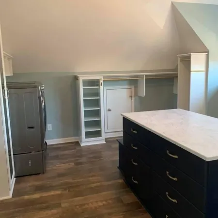 a kitchen with a wood floor