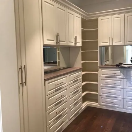 a kitchen with white cabinets