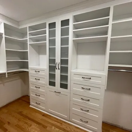 a white cabinet with drawers