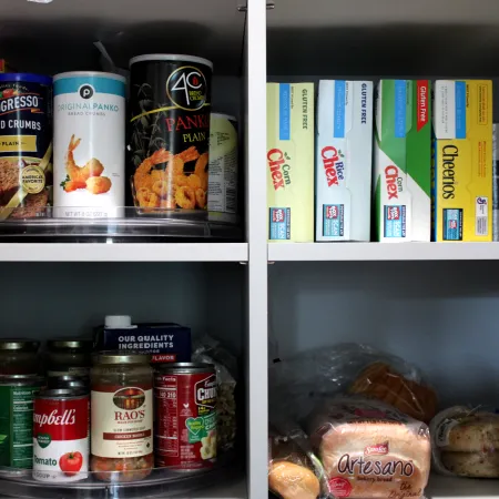 a shelf with food and drinks on it