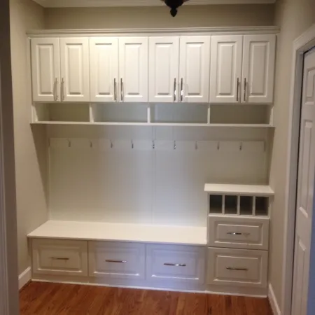 a white kitchen with white cabinets