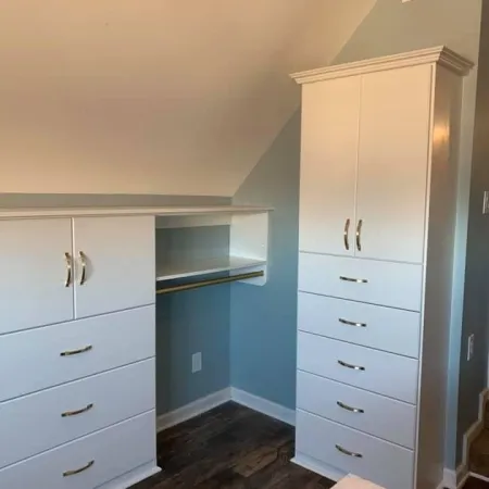 a room with white cabinets