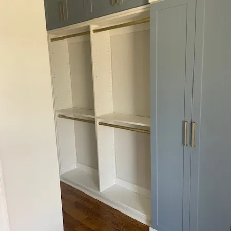 a white cabinet in a room