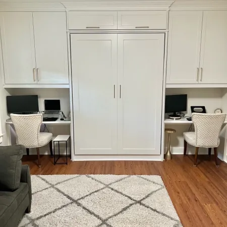 a room with white cabinets