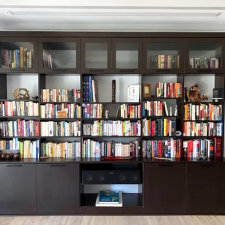 a large book shelf with many books