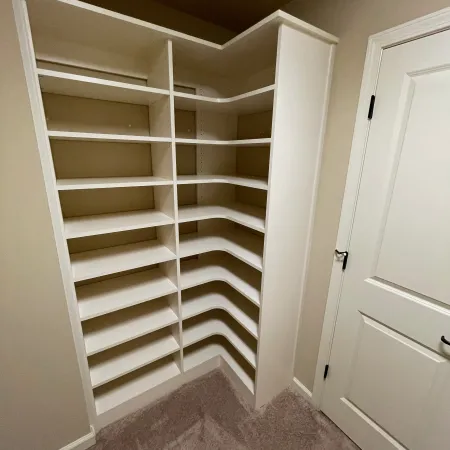 a room with white cabinets