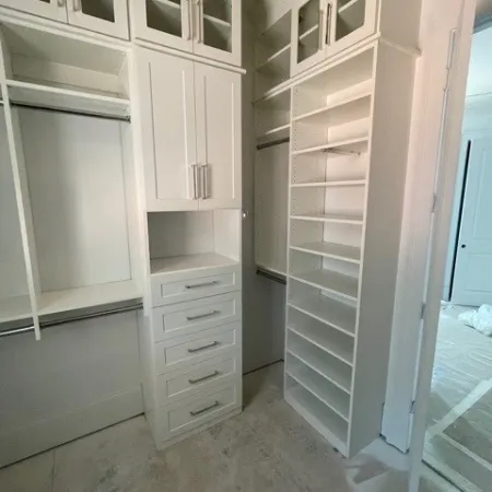 a white cabinet in a room