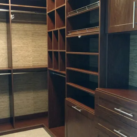 a room with a shelf with books