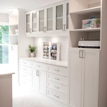 a white kitchen with white cabinets