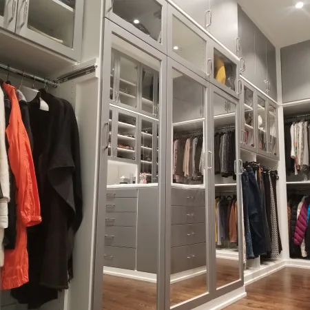 a closet with a glass door