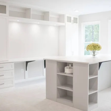 a white kitchen with white cabinets