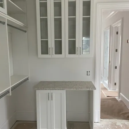 a white cabinet in a room