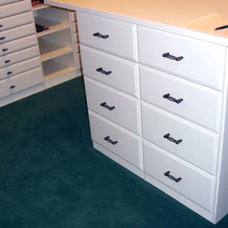 a white dresser with drawers