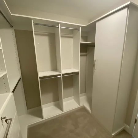 a room with white cabinets