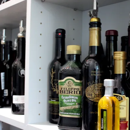 a shelf with bottles of alcohol on it