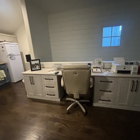 a room with a desk and a chair