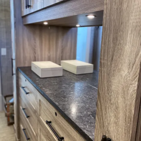 a kitchen with a countertop and cabinets