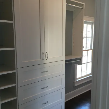 a white cabinet in a room