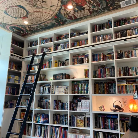 a shelf with many books on it