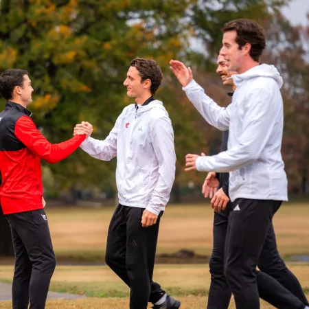 a group of men running