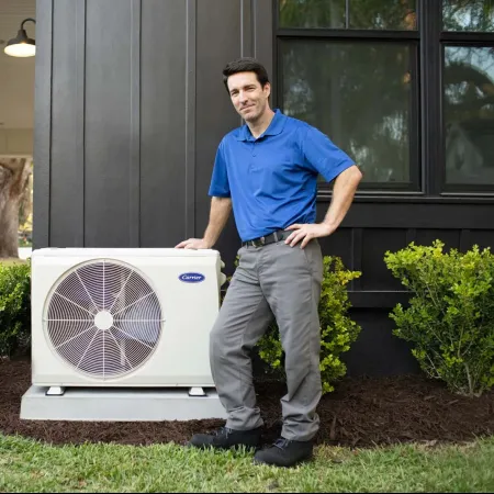 a person standing next to a fan