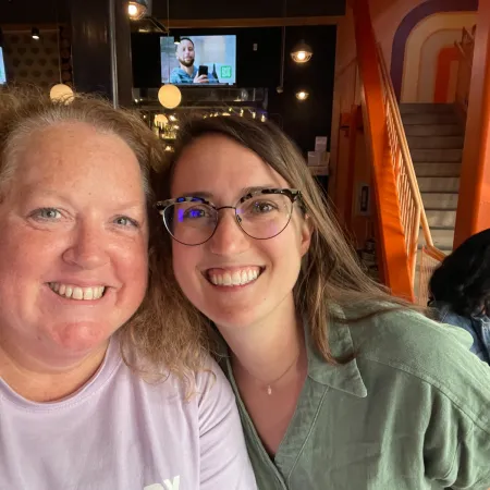 a couple of women wearing glasses