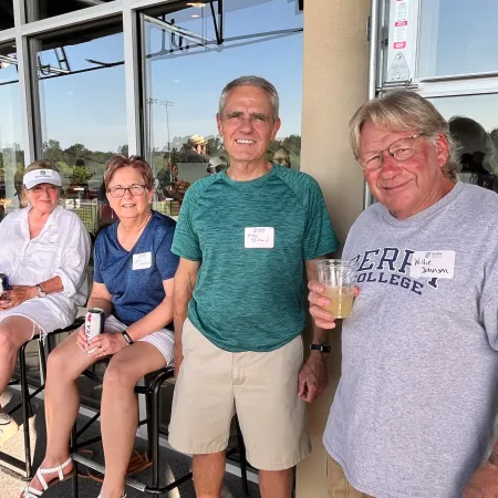 a group of people sitting in chairs