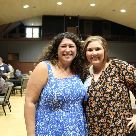 a couple of women posing for a picture