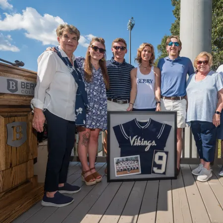 a group of people posing for a photo