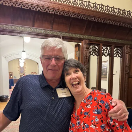 a man and woman posing for a photo