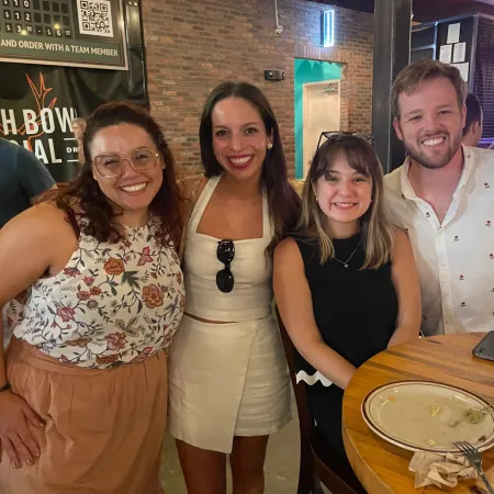 a group of people posing for a photo