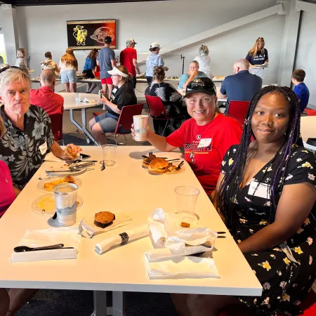 Margaret Ireri et al. sitting at a table