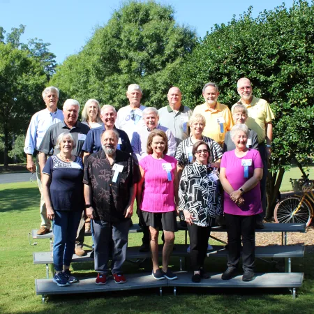 a group of people posing for a photo