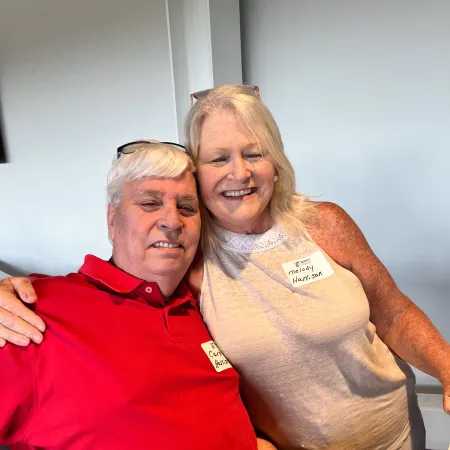 a man and woman posing for a picture