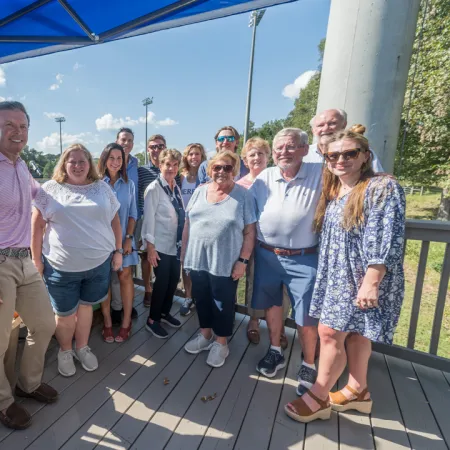 a group of people posing for a photo