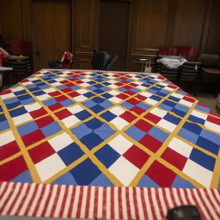 a table with a checkered cloth on it